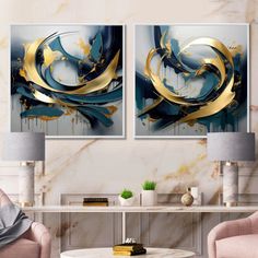 two paintings on the wall in a living room