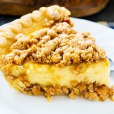 a piece of pie sitting on top of a white plate