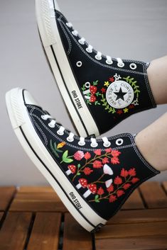 Custom embroidery converse sneakers/ Mushroom,flower  embroidered shoes/Custom converse high tops embroidered /Mushroom embroidered sneakers  💸 Price includes Converse Shoes and floral embroidery as shown 🌸 You can send me your Converse/Vans shoes or I can buy them for you. We stock all the Converse and Vans shoes you want, if you want other Converse/Vans shoes in the store, please message us. Your embroidered Converse/Vans shoes will be available for shipping in 7-15 days. 🌸 I started hand embroidering on fashionable clothes and handbags over 20 years ago - and now on CONVERSE/VANS shoes, an American icon, a must-see classic! I'm excited to give your Chuck Taylor shoes a new look with beautiful, nature-inspired embroidery. All images, designs and text used by CUSTOMSHOEDESIGNSOHO are c Custom Converse High Tops, Embroidery Converse, Embroidered Sneakers, Chuck Taylor Shoes, Embroidered Converse, Custom Converse, Embroidered Shoes, Fashionable Clothes, Shoes Custom