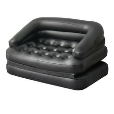 an inflatable air bed is sitting on the ground