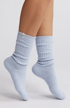 These soft, stretchy ribbed socks have a cozy slouchy fit through the ankles and reinforced heels and toes for durability. 99% polyester, 1% elastane Machine wash, tumble dry Imported Comfortable Warm Solid Color Socks, Comfortable Ribbed Casual Socks, Comfortable Casual Ribbed Socks, Casual Snug Super Soft Socks, Warm Comfortable Plain Color Socks, Casual Mid-calf Ribbed Socks, Soft Stretch Socks For Fall, Casual Super Soft Cozy Fit Socks, Soft Snug Casual Socks