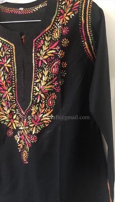 "Comfortable 100% Pure cotton blouse with multicolor embroidery. Length: 35inches \"Embroidery Design May Vary\"" Festive Tunic With Floral Embroidery For Navratri, Festive Floral Embroidered Tunic For Navratri, Festive Multicolor Straight Kurta Blouse, Festive Floral Embroidery Tunic For Navratri, Multicolor Tunic Kurta For Eid, Traditional Multicolor Tunic For Eid, Multicolor Long Sleeve Kurta For Festivals, Embroidered Multicolor Tops For Eid, Festive Tops With Embroidered Border For Eid