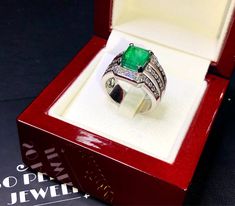 BRAND-NEW!! ONE OF A KIND, HANDCRAFTED RING. EXQUISITE AND FINE CRAFTSMANSHIP! HANDMADE TO LAST FOR AN ETERNITY!! HEIRLOOM PIECE!! PRECIOUS JEWELRY TO BE PASSED ON! PERFECT DRESS RING FOR A LADY OR A GENTLEMAN! 4.25 total carats weight, Certified, Natural emerald ring. This ring offers an important statement of who you are with a jumbo 3.51 carats, VIVID GREEN, transparent, ZAMBIAN EMERALD. Accentuating the EMERALD are the 40 SUBSTANTIAL E/VS, sparkling natural diamonds SUGGESTED RETAIL VALUE: $ Luxury Hallmarked Emerald Signet Ring, Luxury Rectangular Emerald Ring As A Gift, Luxury Rectangular Emerald Ring For Gift, Luxury Gift Emerald Ring Rectangular Shape, Luxury Diamond Cut Emerald Ring As Gift, Luxury Emerald Ring With Diamond Cut For Gift, Luxury Emerald Ring With Diamond Cut As Gift, Luxury Rectangular Emerald Ring, Luxury Gia Certified Diamond Ring Gift