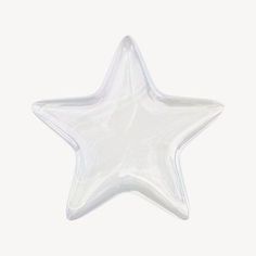 a clear plastic star shaped object on a white background