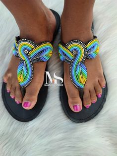 100% handmade using leather and fine beads. Masai beaded sandals are made using the pure original leather and quality African beads.They are inspired by the Masai community They are perfect for any occasion. True to size. We ship worldwide. Feel free to send me a convo for any clarifications Multicolor Toe Loop Sandals For Summer, Handmade Multicolor Sandals For Summer, Multicolor Toe Loop Sandals For Vacation, Summer Beaded Toe Loop Sandals, Beaded Toe Loop Sandals For Summer, Adjustable Multicolor Toe Ring Sandals For Summer, Beaded Flip Flops For Summer, Beaded Flip Flops With Single Toe Strap For Summer, Traditional Multicolor Beaded Flip Flops