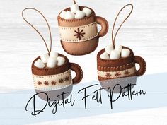 three hot chocolate mugs with marshmallows in them and the words digital felt pattern