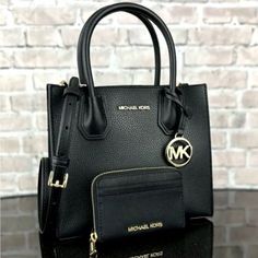 Michael Kors Mercer Crossbody Satchel Bag 100% Authentic New With Tags Retail Price: $498.00 + Tax Handle Drop: 4.25” Adjustable Strap: 22.25”-24.5” Exterior Details: Removable Strap Interior Details: 2 Open Compartments, Center Zip Compartment, 3 Card Pockets 8.75”W X 7.5”H X 4”D Wallet 100% Authentic New With Tags Retail Price: $188.00 + Tax Zip Around Closure Custom Fabric Lining Interior Middle Divider, 4 Card Slots Exterior Front And Back 2 Slip Pockets 4.5”W X 3.25”H X 0.75”D Elegant Michael Kors Wallets, Michael Kors Luxury Wallets For Everyday Use, Luxury Michael Kors Wallet For Everyday, Michael Kors Designer Leather Wallet, Luxury Michael Kors Wallets For Everyday, Designer Michael Kors Leather Wallet, Michael Kors Luxury Evening Wallets, Elegant Evening Wallets By Michael Kors, Luxury Michael Kors Evening Wallets