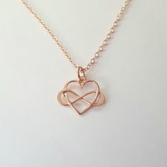 Rose gold infinity Heart Necklace + Rose gold filled flat oval chain (1.6mm) + Rose gold plated on sterling silver infinity heart charm (16mm) + Rose gold filled spring clasp * Every item comes in a pretty gift box * Please contact me for custom sizes or designs Dainty Infinity Rose Gold Necklace, Rose Gold Infinity Necklace For Anniversary, Dainty Rose Gold Infinity Necklace, Infinity Cable Chain Jewelry Gift, Rose Gold Cable Chain Jewelry Gift, Rose Gold Jewelry With Cable Chain For Gift, Hypoallergenic Rose Gold Infinity Jewelry, Elegant Hypoallergenic Rose Gold Charm Necklaces, Elegant Rose Gold Hypoallergenic Charm Necklaces