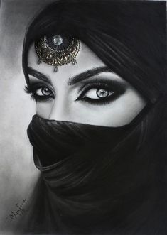 an image of a woman with black hair and makeup on her face, wearing a veil