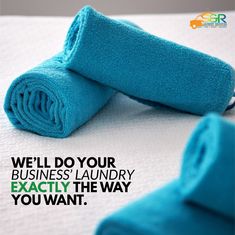 rolled up blue towels sitting on top of a white sheet with the words, we'll do your business laundry exactly the way you want