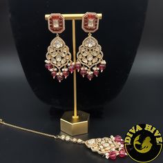 Beautiful silver foil kundan Choker with carved stones. Elevate your style with the exquisite Diva necklace and earring set, exclusively available at our luxury Indian jewelry store. Made with the finest materials, this set is a true reflection of Elegance and glamour, designed to take your look to new heights. Each piece in the set is meticulously crafted to ensure superior quality and attention to detail. The necklace and earring set is the perfect addition to your collection offering versatil Luxury Stone Work Jewelry Sets For Festive Occasion, Luxury Kundan Necklace With Stone Work For Gift, Luxury Silver Kundan Necklace For Festive Season, Elegant Chandbali Sets With Matching Earrings, Luxury Kundan Chandbali Jewelry, Luxury Kundan Jewelry With Stone Work, Luxury Kundan Necklace For Celebration, Formal Kundan Necklace With Matching Earrings, Festive Fusion Jewelry Sets With Matching Earrings