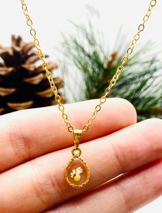 "This beautiful tiny gold mustard seed necklace is perfect for any occasion!  Share your faith and the love of God everywhere you go! This adorable handmade resin necklace makes the perfect gift for your best friend, mom, sister, or just a reminder of your own inner beauty and faith.  Pendant is handmade with resin, real flowers, and mustard seeds. Pendant measurements: 14 mm long and 8 mm wide CHOICES OF CHAIN MATERIAL: 1. 18\" (inch) gold plated chain (This option is featured in photos) 2. 20\" (inch) gold plated chain 3. 18\" (inch) 14K gold filled chain 4. 20\" (inch 14K gold filled chain WHAT IS GOLD FILLED? Gold-filled jewelry contains 100x more gold alloy than gold-plated jewelry. This is because the coating is thicker, gold-filled jewelry will last longer and resist wear and tear b Faith Earrings, Everyday Necklace Gold, Sister In Christ, Mustard Seed Faith, Mustard Seed Necklace, Seed Necklace, Ocean Earrings, The Love Of God, Mustard Seeds