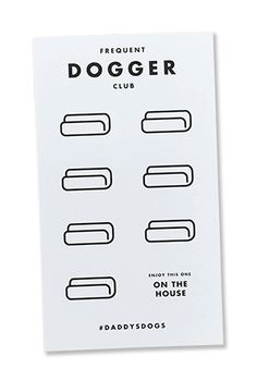 a white sticker with the words doggr club written in black ink on it