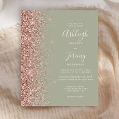 a wedding card with pink glitter on it