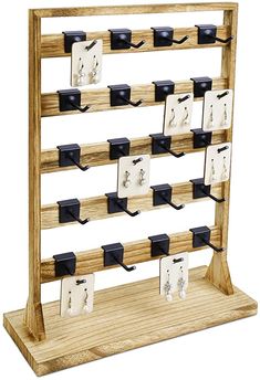 a wooden rack with several different items on it