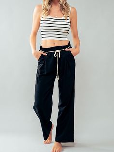 Mid Rise Linen Blend Pull-On Paperbag Straight Pants, offering both comfort and style. Featuring convenient side pockets, a back single pocket, and a straight leg design, these pants effortlessly transition from vacation and resort escapes to beach days, summer outings, spring break adventures, cruises, festivals, and casual parties. The detachable rope belt and elastic waist add a versatile touch to these pants, providing a customizable fit. Crafted from a blend of linen and viscose, they come Casual Straight Leg Bottoms For Travel, Casual Travel Pants With Pockets, Casual Wide Leg Bottoms For Travel, Casual Wide Leg Travel Pants, Versatile Bottoms With Pockets For Vacation, Versatile Vacation Bottoms With Pockets, Casual Wide-leg Bottoms For Travel, Relaxed Fit Bottoms With Pockets For Travel, Relaxed Fit Travel Bottoms With Pockets