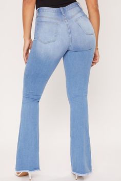 Talk about booty for days! Our Women High-Rise Flare Jean With Frayed Hem is designed with a super high-rise, single-button closure with front zip, classic five pocket construction, a super trendy flared fit with frayed hem, slight distressing and whiskers along front, and belt loops. Style with a bodysuit and heels for a stunning, anytime look! Measurement (Based on size 5) - Inseam: 34” - Rise (To top edge of band): 10” - Leg Opening: 21” - Model is wearing size 3 Machine wash cold. Tumble dry