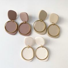 six pairs of earrings with different shapes and colors