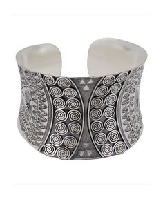 Step into a world where art meets adornment with the Hilltribe Silver Wide Cuff Bracelet. Handcrafted by talented artisans from the hills, this breathtaking piece captures the spirit and finesse of tribal designs. Durable by design and incredibly chic by nature, this bracelet isn't just an accessory – it's a tale of culture, tradition, and unparalleled craftsmanship Material: Sterling Silver Swirly Tribal Etching: A front-facing masterpiece showcasing the beauty of tribal artistry Perfect Fit: A Unique Fish, Swirly Designs, Wide Cuff Bracelets, Hill Tribe Silver, Wide Cuff, Fish Design, The Hills, Laos, Etching