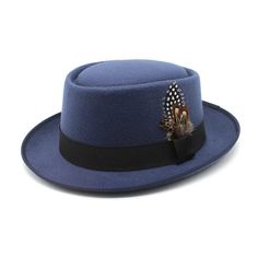 Make a Statement with the Brixton Felt Pork Pie Hat by EFFENTII Modern style meets vintage charm with EFFENTII's Brixton Felt Pork Pie Men's Hat. This iconic accessory is an ode to times gone by, yet fits seamlessly into today's fashion landscape. Whether you're aiming for a laid-back weekend vibe or elevating your evening attire, this hat has got you covered. Available in a variety of dazzling colors, it ensures you're not just in the conversation but leading it. Retro, refined, and undeniably Classic Brown Top Hat For Winter, Formal Brown Top Hat For Fall, Winter Retro Adjustable Fedora, Vintage Fitted Felt Hat For Fall, Vintage Top Hat With Short Brim For Fall, Vintage Short Brim Top Hat For Fall, Fitted Vintage Fedora For Fall, Retro Winter Fedora With Flat Brim, Vintage Fitted Fedora For Fall