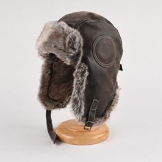 eBay  Please be reminded that due to lighting effects and monitor brightness/contrast setting, the color tone of the website photo and the actual item could be slightly different. This item is for one hat. Russian Ushanka Cossack Hats Trapper Aviator Bomber Faux Leather Fur Casual Warm Material: faux leather Color: black, brown Size: one size(22-22.8in/56-58cm) Black Ushanka, Brown Hats With Faux Fur Lining And Ear Flaps, Ushanka Hat Side, Russian Fur Hat Aesthetic, Russian Ushanka, Ushanka Hat, Brown Faux Fur Hat With Ear Flaps, Cossack Hat, Curated Wardrobe