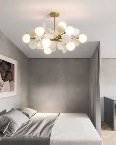 a bedroom with grey walls and white bedding