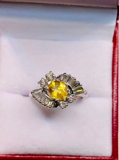 Stunning 18k White Gold Natural Yellow Sapphire Diamonds rounds and Baguette Ring: 100% Genuine Natural Sapphire: Sapphire 6.5x5.1 mm 0.90 CT Side Diamonds: 0.50 CT Color: G Clarity: VS2 Total ring weight: 4.9 GR 18k White Gold Ring sizing available free of charge For more information regarding this item feel free to reach me so I can accommodate your needs. Thank you Oval Diamond Ring With Baguette Diamonds, Oval Rings With Baguette Diamonds, Oval Diamond Ring With Baguette Diamonds For Anniversary, Oval Diamond Rings With Baguette Diamonds, Oval Baguette Diamond Ring For Anniversary, Oval Ring With Baguette Diamonds For Anniversary, Oval Rings With Baguette Diamonds For Anniversary, Elegant Oval Diamond Ring With Baguette Diamonds, Oval Yellow Gold Ring With Baguette Diamonds