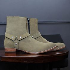 Handmade Men Beige  Harness Boots | Vintage 1990s Men's Biker Boot | Suede Leather Stone Engineer Boots | Men Buckle Motorcycle Rider Boots Description: Embrace vintage style with these Handmade Men's Beige Harness Boots. Inspired by classic 1990s biker boots, these boots feature a rugged design with a secure buckle, perfect for the modern motorcycle rider. Crafted from premium black leather, the stone engineer boots are built to withstand the demands of the road while offering a timeless, stylish look. These buckle motorcycle rider boots combine durability with style, making them a perfect addition to any wardrobe. The vintage design, coupled with high-quality materials, ensures long-lasting wear and comfort. Key Features: Material: Premium Beige leather for a rugged, stylish look. Vintag Fall Outdoor Moto Boots With Snip Toe, Vintage Leather Moto Boots For Streetwear, Vintage Leather Moto Boots For Biker Events, Fall Moto Boots For Biker Events With Snip Toe, Snip Toe Moto Boots For Biker Events In Fall, Fall Snip Toe Moto Boots For Biker Events, Engineer Boots Men, Modern Motorcycle, Mens Biker Boots