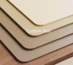 four different types of mats on top of each other, with the words custom size