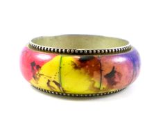 Silver Brass Wide Dyed Bone Bracelet Bangle Tribal Boho Hippie Multicolor Colorful Vintage Jewelry by paleorama on Etsy Colorful Bohemian Bangle Bracelets, Bohemian Rainbow Bangle Bracelet, Multicolor Festival Bangle Bracelet, Multicolor Bohemian Bangle Cuff Bracelet, Multicolor Hand Painted Bangle Jewelry, Hand Painted Multicolor Bangle Jewelry, Bohemian Multicolor Bangle For Gift, Bohemian Multicolor Bangle As Gift, Multicolor Hand Painted Bangle