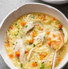 two bowls filled with chicken and dumpling soup