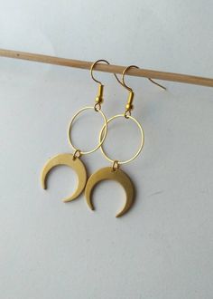 This pair is made of hypoallergenic brass parts. No Nickel and no Lead. . Light to wear and easy to combine. 🌿 . The item will arrive to you wrapped as a gift in a paper gift bag. . 》SHIPPING: If you need a tracking number for your order change the shipping option before checkout. 🌎 . If you have any questions please contact me, I usually respond quite fast 💌 .  ☆ 》Please before ordering read my shop's announcement and check carefully the estimated delivery time Etsy gives you. I am only resp October Jewelry, Crescent Moon Earrings, Spike Earrings, Witchy Jewelry, Gold Moon, Christmas Gift Jewelry, Moon Earrings, Gothic Jewelry, Moon Phases