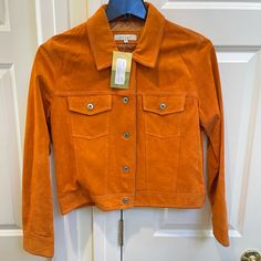 Net Sorb Tangerine Orange Suede Jacket. Vintage 90s Suede In Tangerine With Snap Button Fastening And Two Breast Pockets. Could Be Worn With Buttons Open Or Closed. Casual Fitted Leather Jacket With Button Closure, Spring Collared Leather Jacket With Pockets, Spring Single-breasted Leather Jacket With Long Sleeves, Single-breasted Long-sleeve Leather Jacket For Spring, Fitted Leather Jacket With Buttons For Spring, Collared Single Breasted Leather Jacket For Spring, Spring Collared Single Breasted Leather Jacket, Spring Single Breasted Collared Leather Jacket, Spring Collared Single-breasted Leather Jacket