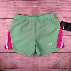 Light Green With Pink And White Accents Pink Short Bottoms For Playwear, Pink Stretch Shorts For Playwear, Stretch Pink Shorts For Playwear, Spring Nike Pink Athletic Shorts, Pink Nike Athletic Shorts For Spring, Nike Pink Athletic Shorts For Spring, Nike Pink Athletic Shorts For Summer, Green Sporty Bottoms For Playwear, Sporty Green Bottoms For Playwear