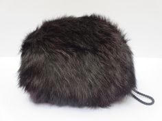 Small luxurious vintage fur muff or hand warmer  Nayural Long-haired Bright black  It features a zippered pocket inside Black wrist cord and black lining For girl or for women Perfect for an evening accessory A touch of 1960's vintage chic ! In good condition  Size : 10 inches~ 26 cm   TODAY DISCOUNT CODE ! VISIT OUR HOME PAGE  https://www.etsy.com/ca/shop/LesCurieux?ref=hdr_shop_menu 10 Hand Muff, Winter Accessories Fashion, Evening Accessories, Vintage Fur, Fashion Winter, Black Vintage, 1960s Vintage, Mitten Gloves, Vintage Chic