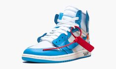 For his third edition of the monumental Off-White x Air Jordan 1, Virgil Abloh focused on the "UNC" colorway of Michael Jordan's first signature shoe. Released in June 2018, the Off-White x Air Jordan 1 "UNC" features the recognizable white and Carolina blue leather upper. The colors are complemented by Abloh's deconstructed aesthetic and signature details such as bright orange detailing and a red zip tie. Like the "Chicago" and all-white colorways before it, the Off-White x Air Jordan 1 "UNC" w Air Jordan Off White, Unc Shoes, Air Jordan 1 Unc, Jordan 1 Unc, Jordan Off White, Jordan Ones, Casual Styles, Air Jordan 1 Retro High, Air Jordan 1 High