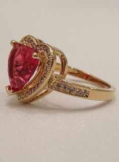 The Ruby Heart Ring | SPARROW Red Heart Ring, Ruby Heart Ring, Ruby Heart, Dainty Band, Red Ruby, Micro Pave, Timeless Classic, Red Heart, Rhodium Plated