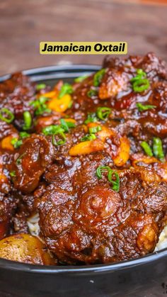 a close up of a plate of food with meat and vegetables on it, text reads jamaican oxtaili