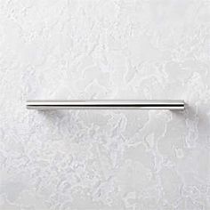 a bathroom door handle on a white wall