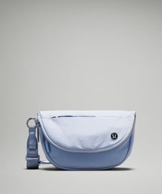 Lululemon Bag With Removable Pouch For Outdoor Activities, Lululemon Nylon Bags With Functional Pockets, Versatile Lululemon Bag With Functional Pockets, Functional Outdoor Lululemon Bags, Functional Lululemon Shoulder Bag For Travel, Functional Lululemon Belt Bag With Cell Phone Pocket, Lululemon Functional Belt Bag With Cell Phone Pocket, Casual Lululemon Bag With Cell Phone Pocket, Functional Lululemon Bags For Everyday Use