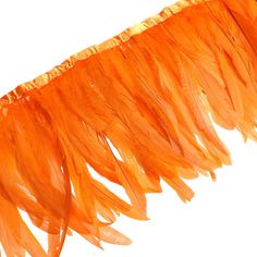 an orange feather is hanging from the ceiling