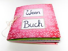 a pink book with german words on it