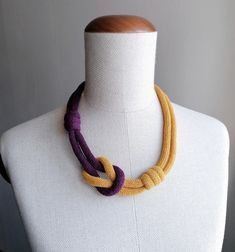 "Handmade Yellow Chunky Cord Necklace, Woven Handmade Jewelry, Fabric Necklace, Gray and Plum Necklace, Infinity Knot Choker, Two Tones Necklace, Woman's Fashion Necklace, Macrame Jewelry. Colorful, Light, Soft and Cool... Perfect for to make your outfit more exciting! AVAILABLE IN 3 SIZES CREATED AND MADE  IN SWEDEN BY ME. This model is color: \"BLACKBERRY & SAFFRON\" To this necklace model I gave the name of \"AMÉLIE\"  Like AMÉLIE POULAIN, From the movie: \"The Fabulous Destiny of Amélie Poul The Fabulous Destiny Of Amélie Poulain, Yellow Plums, Low Cut Dresses, Infinity Knot, Quirky Jewelry, Rope Jewelry, Have A Happy Day, Magnetic Jewelry, Fabric Necklace