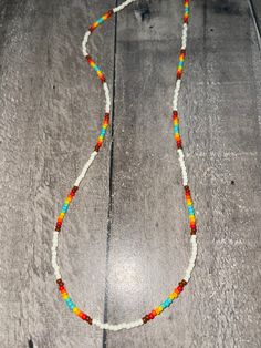 Off white and Aztec sunset pattern seed beaded 16 inch claw clasp necklace/choker White Choker Necklace For Festival, Colorful Beaded White Jewelry For Festivals, White Beaded Chain Necklaces For Festivals, White Single Strand Beads For Festival, White Round Beaded Necklaces For Festival, White Bohemian Choker With Beaded Chain, White Beaded Necklace For Festivals, White Bohemian Beaded Chain Choker, Bohemian White Beaded Chain Choker