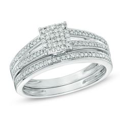 a white gold ring set with two rows of diamonds