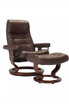 the reclining chair and ottoman is shown in brown leather with wood trimmings