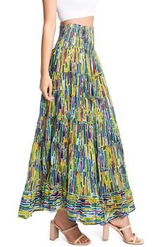 Light and airy gauze linen maxi skirt with bright abstract prints with a stretchy, smocked waist. Convertible, 2-in-1 style can also be worn as a dress! Fabric can be slightly sheer under bright lights. CARE | Hand Wash ColdCONTENTS | 100% Cotton MEASUREMENTS | 40"/ 102 cm Top to Bottom (Size Small) MODEL | 5'8 - wearing a size SmallIMPORTED Relaxed Multicolor Gathered Maxi Skirt, Multicolor Relaxed Maxi Skirt With Gathered Detail, Elegant Multicolor Maxi Dress With Elastic Waistband, Flowy Green Maxi Skirt For Vacation, Casual Multicolor Flowy Maxi Dress, Multicolor Maxi Dress With Elastic Waistband For Summer, Spring Multicolor Maxi Skirt With Voluminous Fit, Casual Multicolor Tiered Skirt Maxi Dress, Multicolor Voluminous Maxi Skirt For Spring