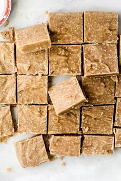 several pieces of brown fudge sitting on top of a counter