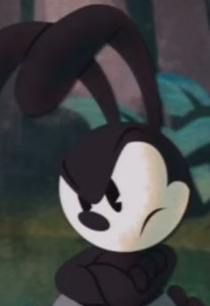 a cartoon character with an angry expression on his face and ears, standing in front of a forest