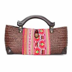 Wood Handle Sedge Bag With Vintage Hmong Fabric Fair Trade Made. 14" X 7" Handcrafted In Thailand, This Beautiful Bag Features Wooden Handles, A Zipper Top And For Your Convenience, An Inside Zipper Pocket. Woven Weave From Sedge(Plant). Full Lining You Will Receive One Similar To The First Photo In Terms Of Color Which Is The Mocha With The Floral Fabric Design. Since Each Bag Is Handcrafted, Designs May Differ Just Slightly. Traditional Top Handle Straw Bag, Traditional Pink Woven Bag, Red Bohemian Straw Bag Rectangular, Bohemian Red Rectangular Straw Bag, Red Bohemian Rectangular Straw Bag, Traditional Brown Shoulder Bag With Weaving Work, Traditional Rectangular Straw Bag, Traditional Woven Top Handle Bag, Traditional Top Handle Woven Bag